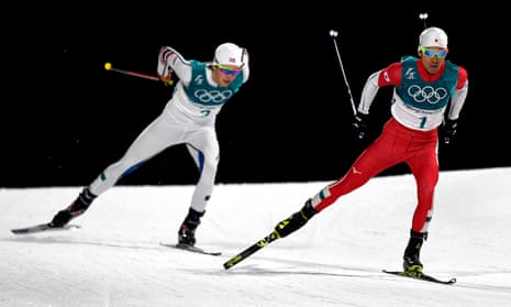 Akito Watabe of Japan and Jarl Magnus Riiber of Norway in the Cross Country portion of the Nordic Combined.
