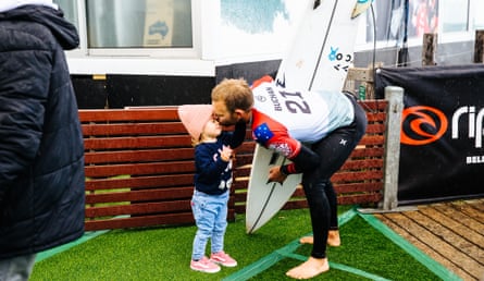 Buchan kisses one of his children