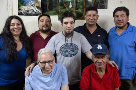 Ben with his biological siblings, Margarita, Wladimir, Marcelo and Luis, plus his birth father Luis (right) and adoptive father David, at his family’s house in Chillán, Chile. They are eight siblings in total, and Ben’s biological and adoptive mothers passed away years ago.