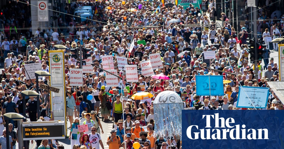 'Masks make us slaves': thousands march in Berlin anti-lockdown protest â€“ video - The Guardian