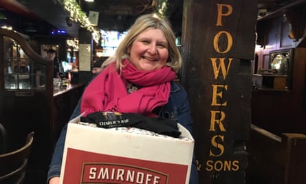 Allison Forbes, of South West Age Partnership, in Charlie’s Bar with gifts donated by local businesses.