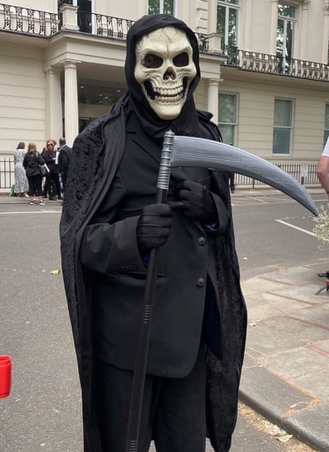 Charles Persinger, 58, dressed up as the Grim Reaper outside Dorland House, where the Covid inquiry hearings are taking place.