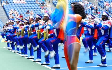 The Morgan State University marching band entertain fans on Arthur Ashe Court before play.