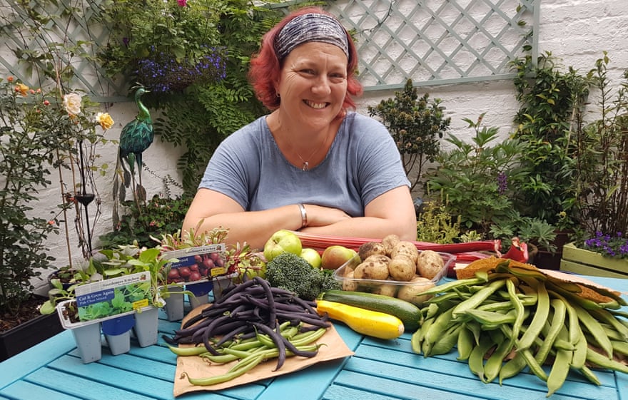 Ginnie O’Farrell with her homegrown produce, the surplus of which she donates to the fresh food bank.