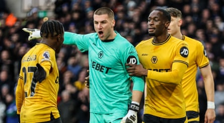 Wolves players argue with each other during their defeat by Ipswich.