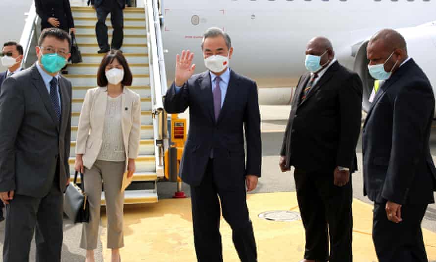 Chinese foreign minister Wang Yi is greeted at Port Moresby airport on Thursday on his first day in Papua New Guinea.