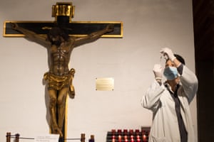 A nurse carrying a syringe with the Pfizer vaccine in the Church of Our Lady of Carmen is ready to vaccinate people over 80 years of age in Zaragoza, Spain.