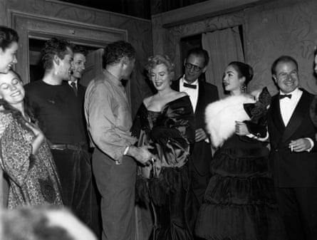 The couple and other people in evening dress