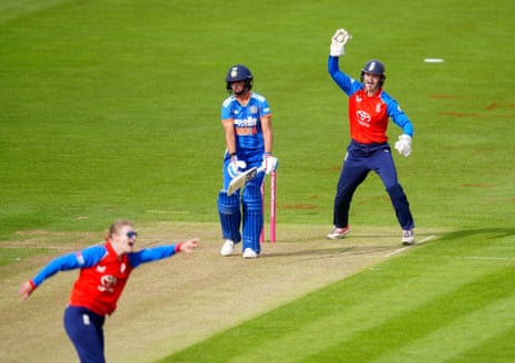 England's Amy Jones celebrates catching out India's Harmanpreet Kaur.