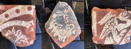 Three fragments of clay tiles.