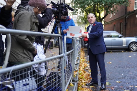 Ben Wallace, the defence secretary, inviting journalists to buy a poppy in Downing Street after cabinet this morning.