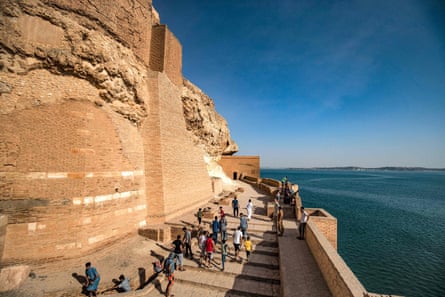 People visit the ruins of the Jaabar Citadel in Syria’s Lake Assad reservoir