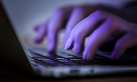 Photo Illustration shows hands typing on a computer keyboard