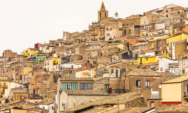 View of homes and buildings in the ancient hill town of Prizzi, Province of Palermo.