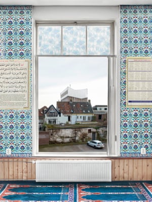 Mosque windows showing Dutch landscapes in the Netherlands by photographer Marwan Bassiouni.