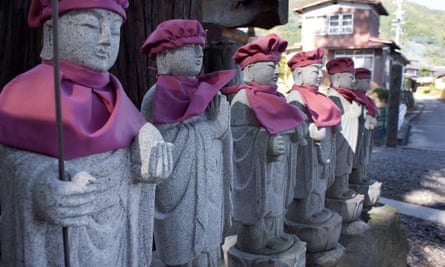 A row of Jizo statues at the entrance of Kaigenji temple. Kaigenji is a 300-year-old Buddhist temple in Chikuma, Nagano prefecture, Japan.