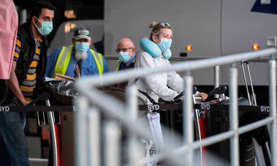 Passengers arrive in Sydney off a Qatar Airways flight on May 01.