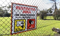 Signage along the perimeter fence of the Melbourne Immigration Transit Accommodation complex