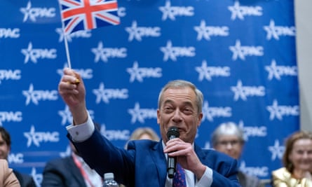 Man in suit waves a union flag