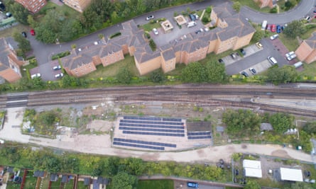 An aerial view of the trackside solar farm .