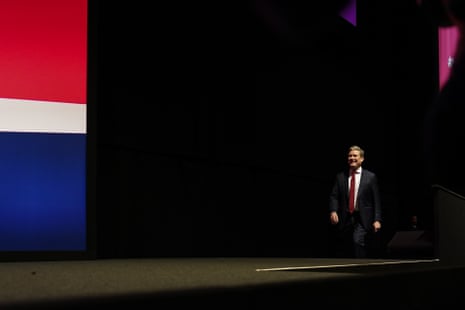 Keir Starmer taking the stage ahead of delivering his speech earlier.