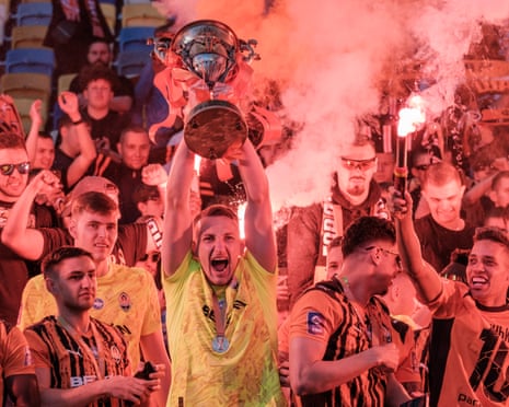 Shakhtar Donetsk’s goalkeeper Dmytro Riznyk lifts the Ukrainian Premier League trophy