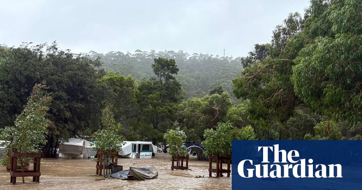 ‘We’ve lost everything, you can see caravans floating away’: flash flooding hits Victoria’s Great Ocean Road