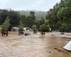 ‘We’ve lost everything, you can see caravans floating away’: flash flooding hits Victoria’s Great Ocean Road