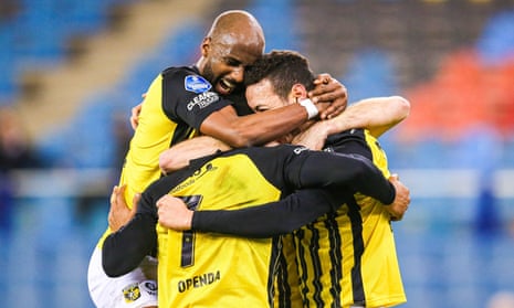 Vitesse celebrate their 1-0 win over Feyenoord on 20 December. They are in fourth place in the Eredivisie, behind the Rotterdam club on goal difference.