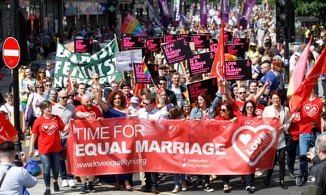 Activists campaigning for an end to Northern Ireland’s ban on same-sex marriage march through Belfast city centre.