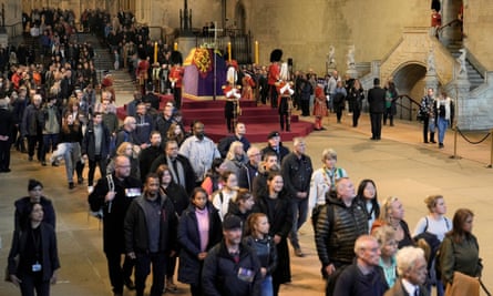 Members of the public file past the coffin of Queen Elizabeth II