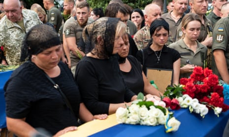 Relatives in the Poltava province of central Ukraine mourn a pilot who died during a combat mission.