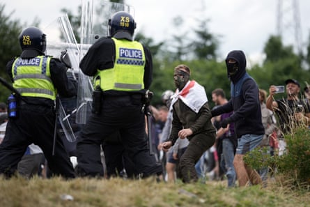 Rioters clash with police outside a hotel used to house asylum seekers in Rotherham this month