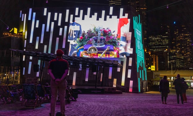 People watching the Queen’s funeral at Federation Square in Melbourne