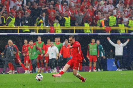 Turkey’s Kerem Akturkoglu scores their third goal against Georgia.