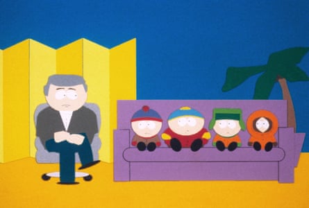 south park boys sit on sofa next to man in swiveling chair