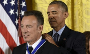 Bruce Springsteen receives the presidential medal of freedom from Barack Obama in November 2016.