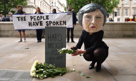 A protester from the global campaigning movement Avaaz articulates the growing view that Theresa May must soften her approach to Brexit after the Tories lost their Commons majority.