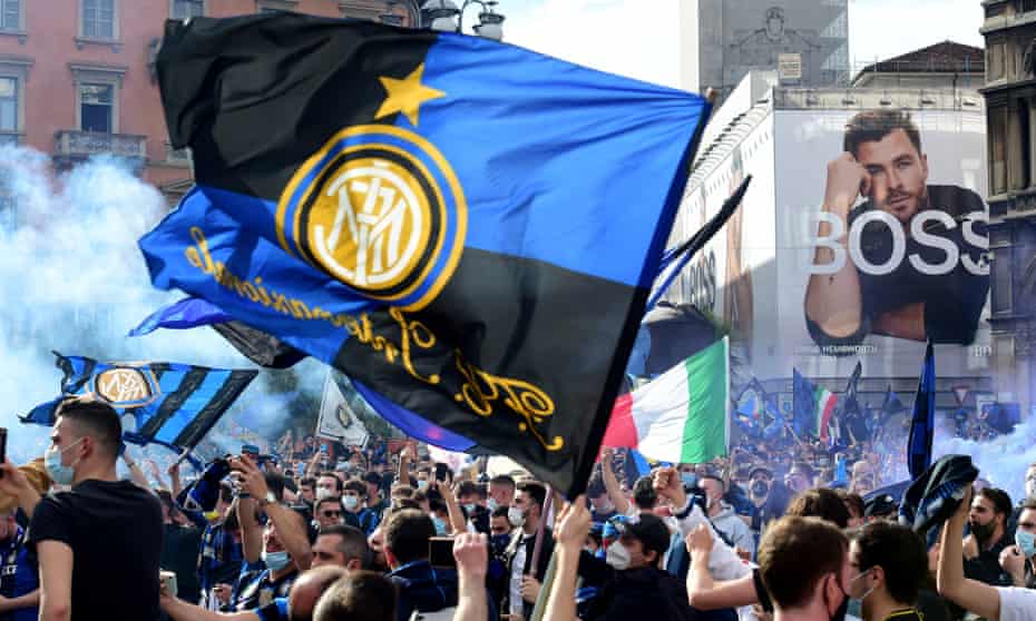 Inter fans celebrate their Serie A title win at the Piazza del Duomo, in Milan.