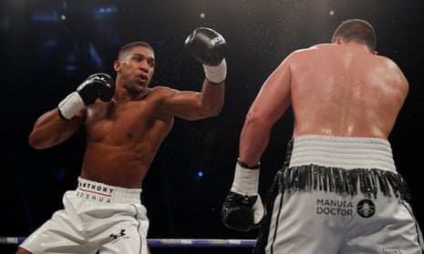 Anthony Joshua in action with Joseph Parker