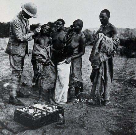 A medical officer taking a sample Buruma Island 1902 WT