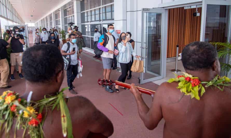 Traditional dancers welcome holidaymakers as Fiji opens its borders to international travellers for the first time in 615 days.