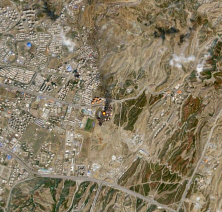 Satellite images show Aqadsieh oil depot was still visibly burning with smoke rising