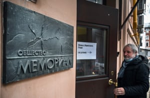 A man enters at the office of human rights group Memorial in Moscow.