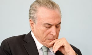 Brazilian President Michel Temer attends a celebration of small enterprise at Planalto Palace in Brasilia on 4 October, 2017. He faces charges of corruption, racketeering and obstruction of justice.