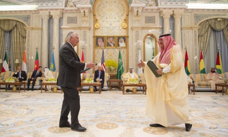 Rex Tillerson and Crown Prince of Saudi Arabia Muhammad bin Nayef shake hands after signing an agreement in Riyadh on 21 May 2017.