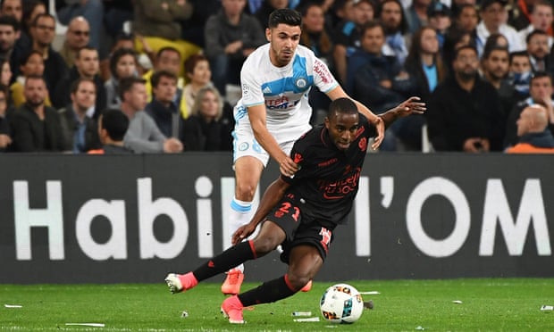 Marseille’s Morgan Sanson, who is Ligue 1’s top assist provider this season, tries to get the better of Nice’s defender Ricardo Pereira.