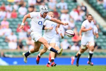 Curtis Langdon of England kicks down field.