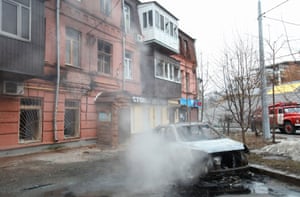 A burnt-out car in Kharkiv