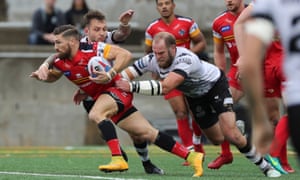 Londonâs Jarrod Sammut attempts to break away from the Wolfpack during the Million Pound Game last October.